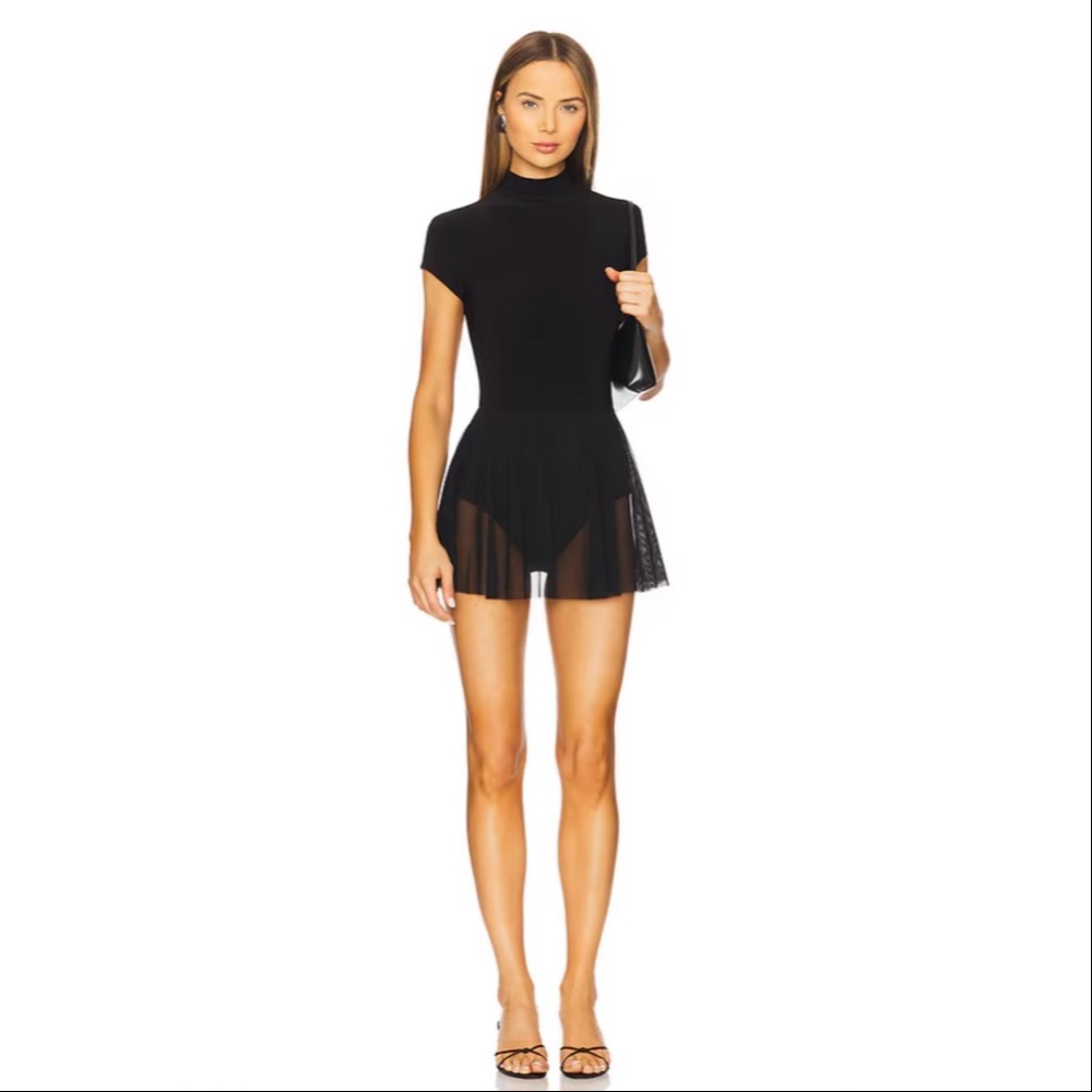 Norma Kamali Mock Neck Cap Sleeve Flared Pickleball Dress in Black